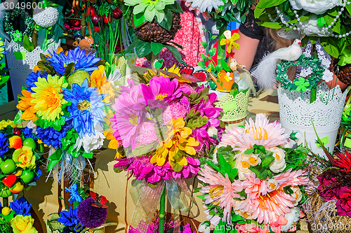 Image of Artificial flowers, made from a material different Souvenirs and