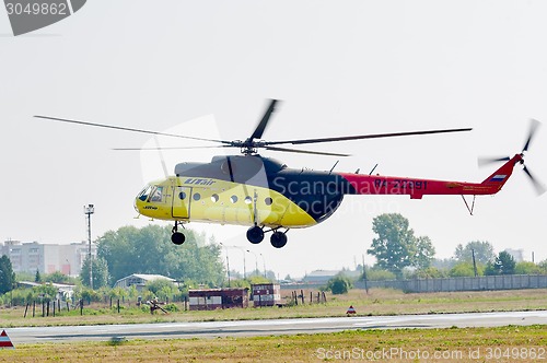 Image of Passenger helicopter MI-8 landing