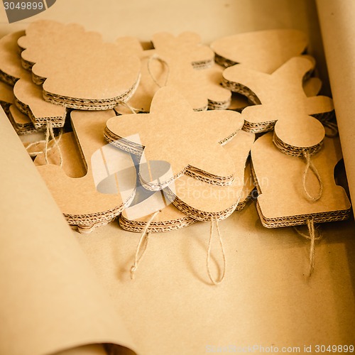 Image of Cardboard toys for the Christmas tree or garland. Creative decorations. Selective Focus