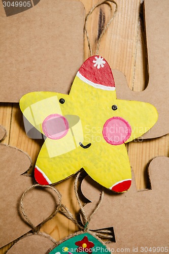 Image of Cardboard toys for the Christmas tree or garland. New year decorations.