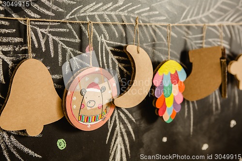 Image of Cardboard toys for the Christmas tree or garland. Creative decorations. Selective Focus