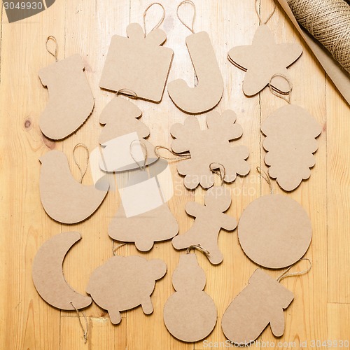 Image of Cardboard toys for the Christmas tree or garland. New year decorations.