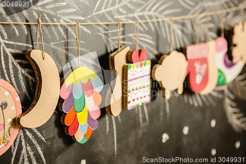 Image of Cardboard toys for the Christmas tree or garland. Creative decorations. Selective Focus