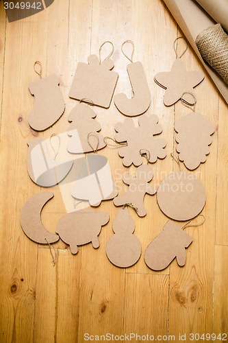 Image of Cardboard toys for the Christmas tree or garland. New year decorations.