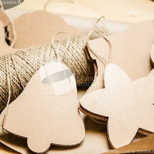 Image of Cardboard toys for the Christmas tree or garland. New year decorations.