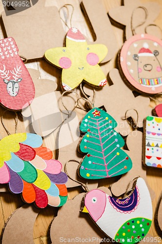 Image of Cardboard toys for the Christmas tree or garland. New year decorations.