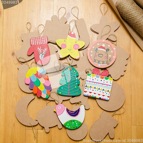 Image of Cardboard toys for the Christmas tree or garland. New year decorations.