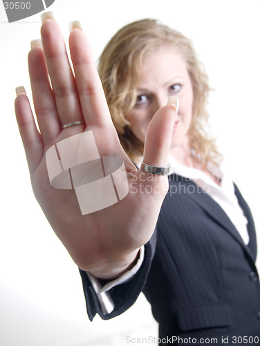 Image of Woman holding hand up