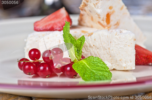 Image of cream berries dessert