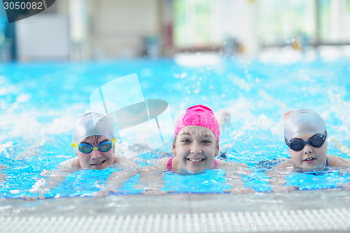 Image of children group  at swimming pool