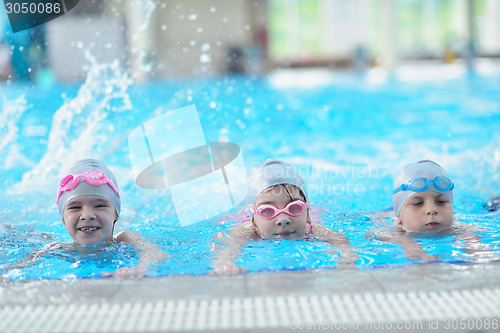 Image of children group  at swimming pool