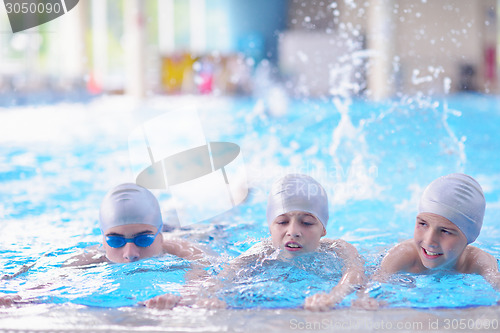 Image of children group  at swimming pool