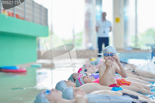 Image of children group  at swimming pool