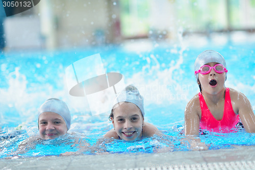 Image of children group  at swimming pool