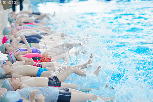 Image of children group  at swimming pool