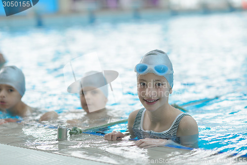 Image of children group  at swimming pool