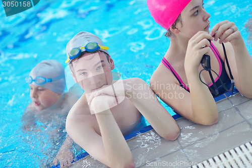 Image of children group  at swimming pool