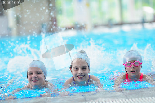 Image of children group  at swimming pool