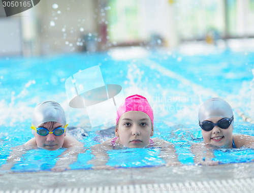 Image of children group  at swimming pool