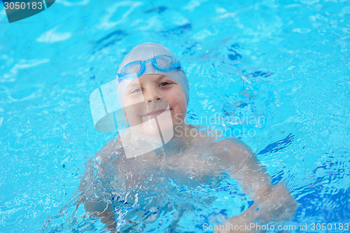 Image of child portrait on swimming pool