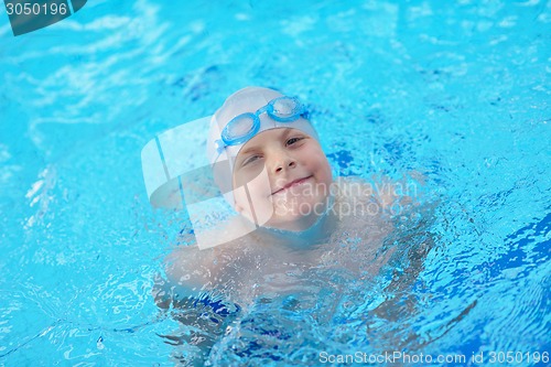 Image of child portrait on swimming pool