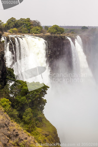 Image of The Victoria falls with mist from water