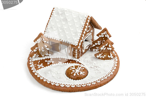 Image of Holiday Gingerbread house isolated on white. 