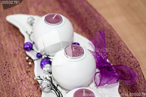 Image of House decoration with aromatic candle violet color