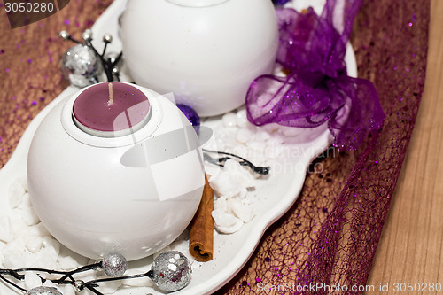 Image of House decoration with aromatic candle violet color