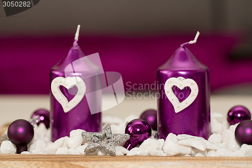 Image of House decoration with aromatic candle violet color