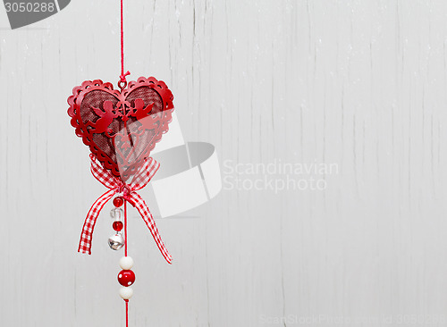 Image of eart as a symbol of love/vintage card with red heart on Grunge v