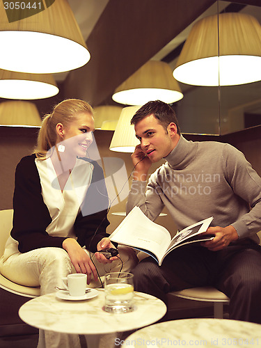 Image of couple with cell phones