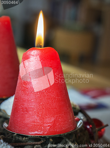 Image of Datail burning red candle