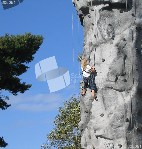 Image of Brave child climbing