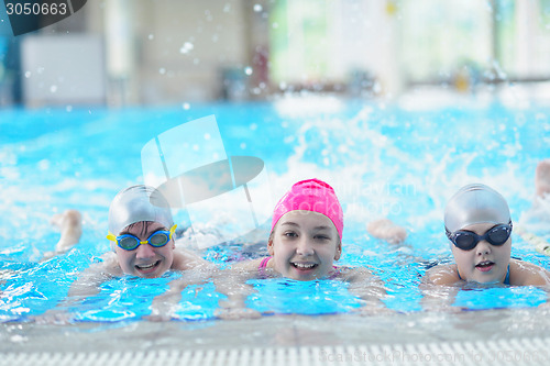 Image of children group  at swimming pool