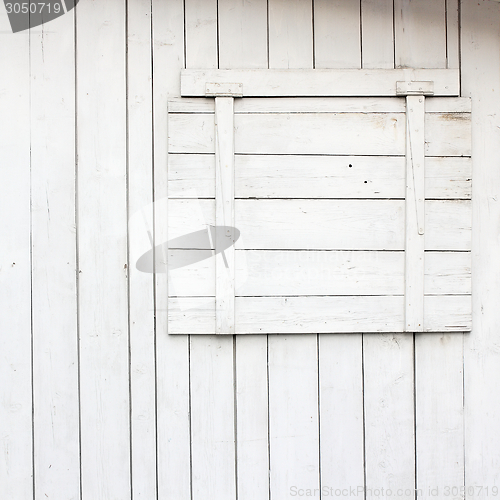 Image of window with closed blind