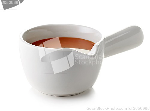 Image of bowl of melted caramel sauce