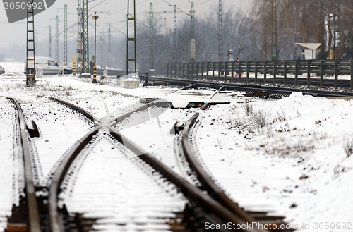 Image of Railroad tracks in the snow