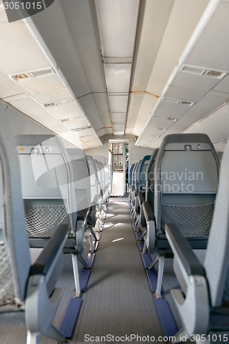 Image of Interior of an airplane with many seats