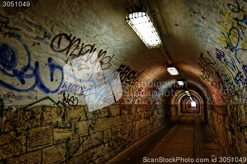 Image of Dark undergorund passage with light