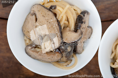 Image of Italian spaghetti pasta and mushrooms