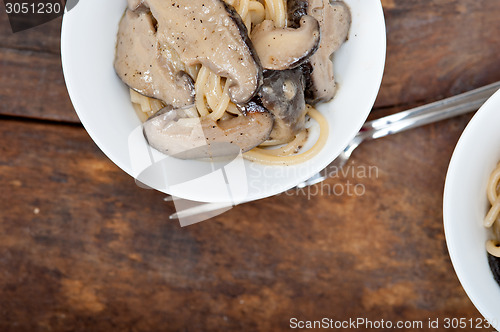 Image of Italian spaghetti pasta and mushrooms