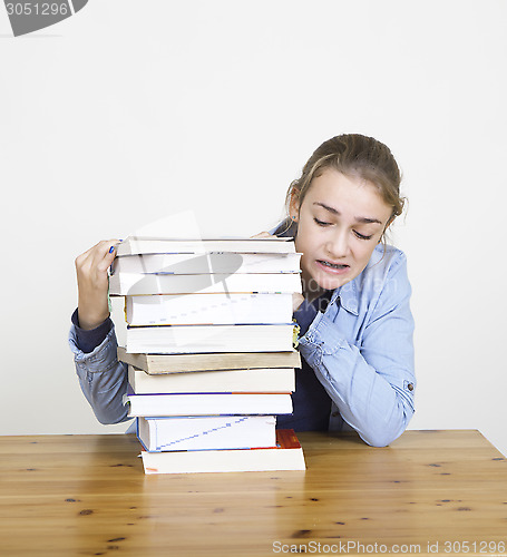 Image of student with books