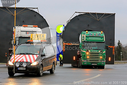 Image of Pilot Car and Two Trucks with Oversize Loads