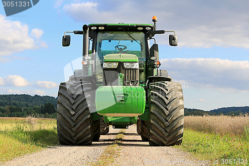 Image of John Deere 7280R Agricultural Tractor on a Rural Road