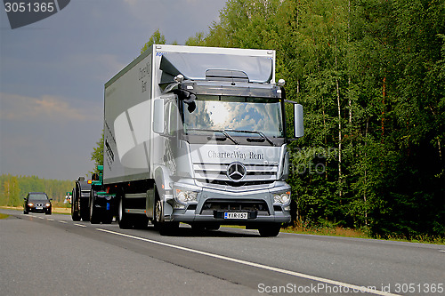 Image of Grey Mercedes-Benz Antos Truck on the Road