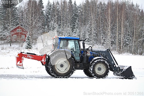 Image of Valtra Tractor Removes Snow with Bucket and Road Drag