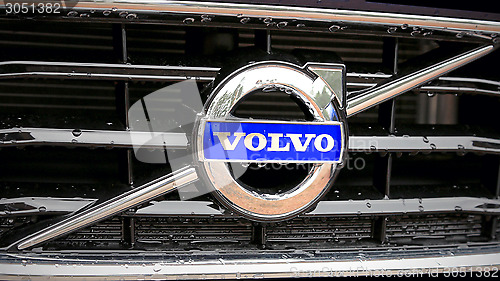 Image of Volvo Sign on the Grille of the Car in the Rain