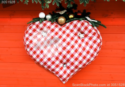 Image of Big heart hanging on red