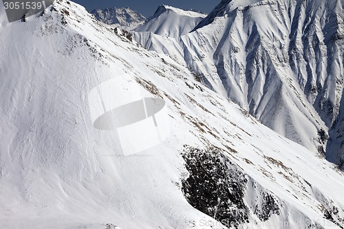 Image of Snowy rocks with avalanches